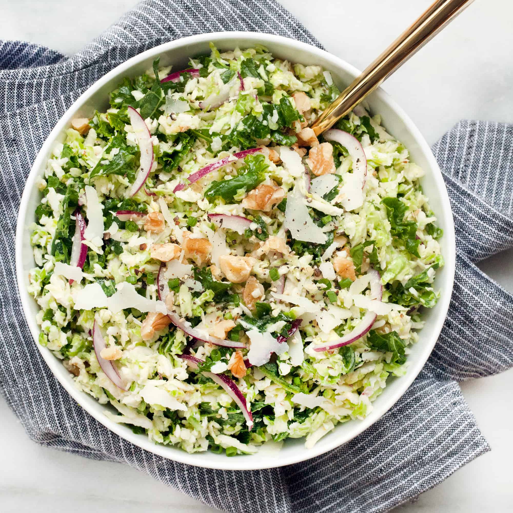 Shredded Brussels Sprout Salad with Kale, Pecorino & Walnuts