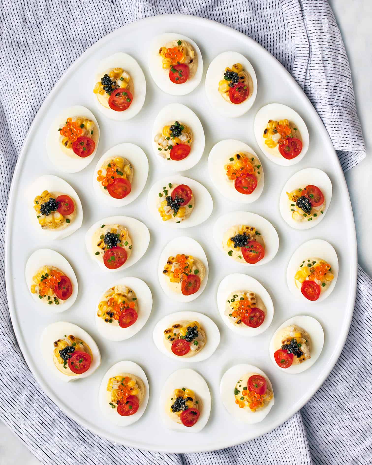 Grilled Corn & Caviar Deviled Eggs Last Ingredient
