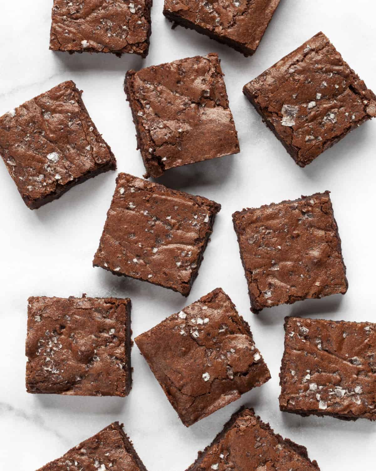 Brownie squares on a marble board.