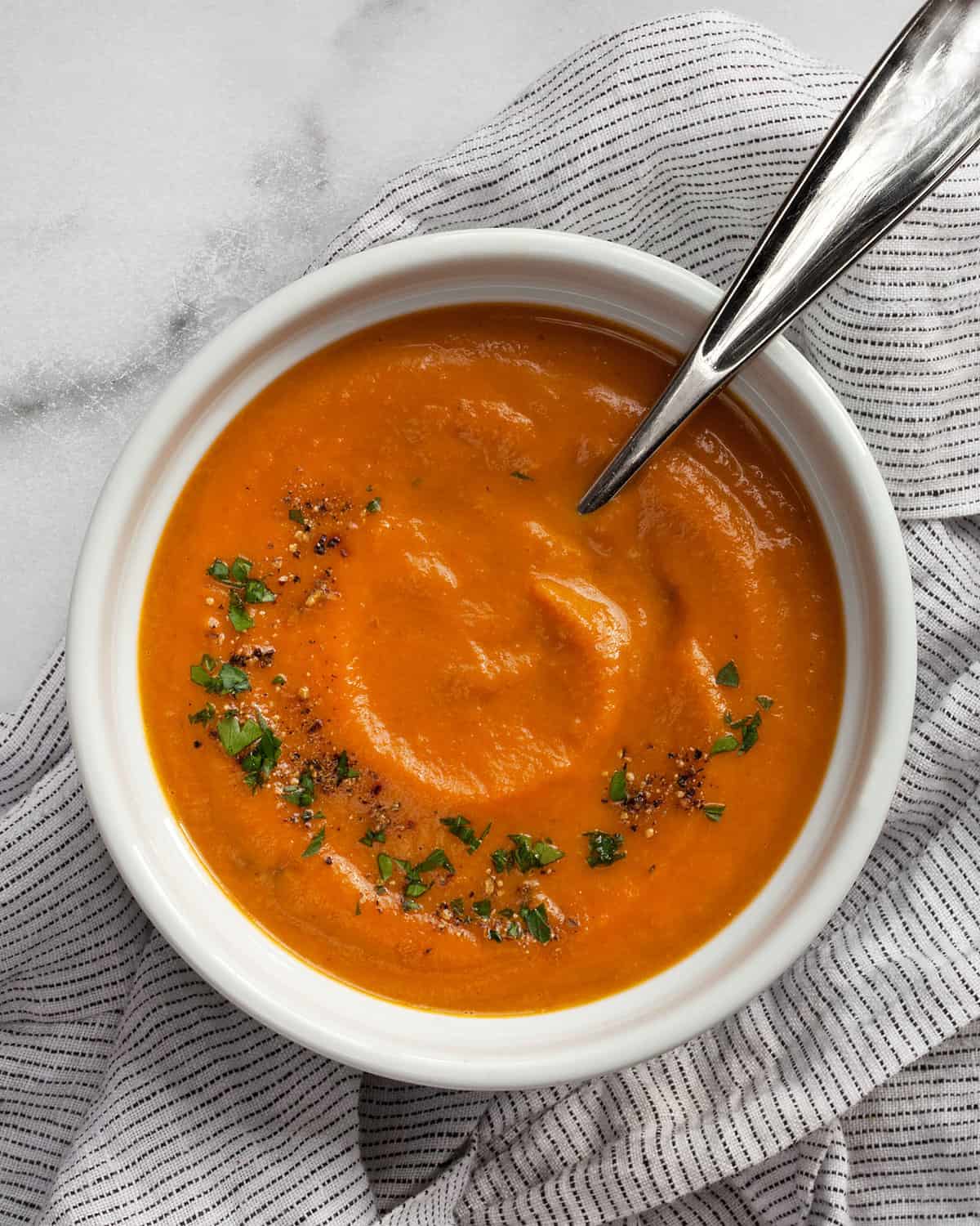 Bowl of roasted carrot soup.