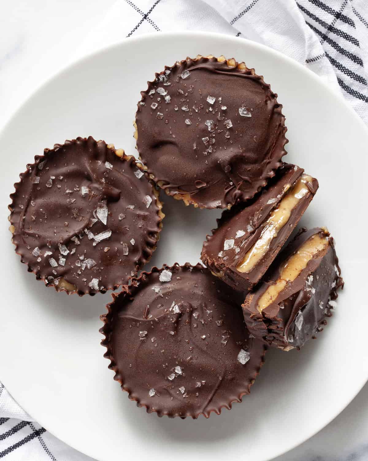 Three whole peanut butter cups and one split in half.