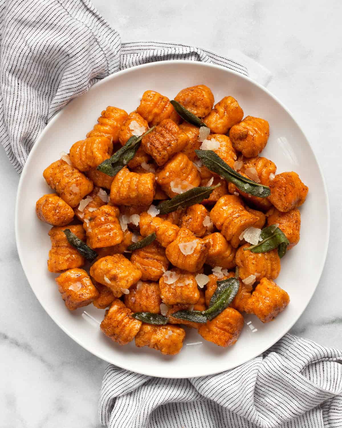 Sweet potato gnocchi on a plate.