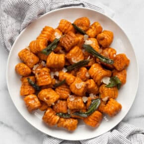 Homemade sweet potato gnocchi on a plate.