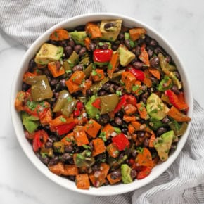 Roasted sweet potato salad in a bowl.