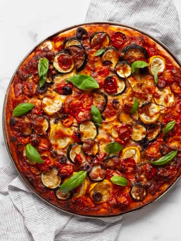 Roasted vegetable pizza with zucchini, eggplant and tomatoes.