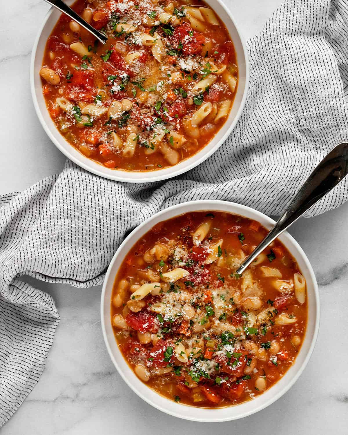 Two bowls of pasta e fagioli.