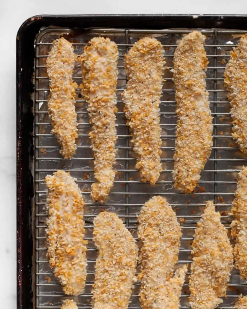 Baked chicken tenders on a rack