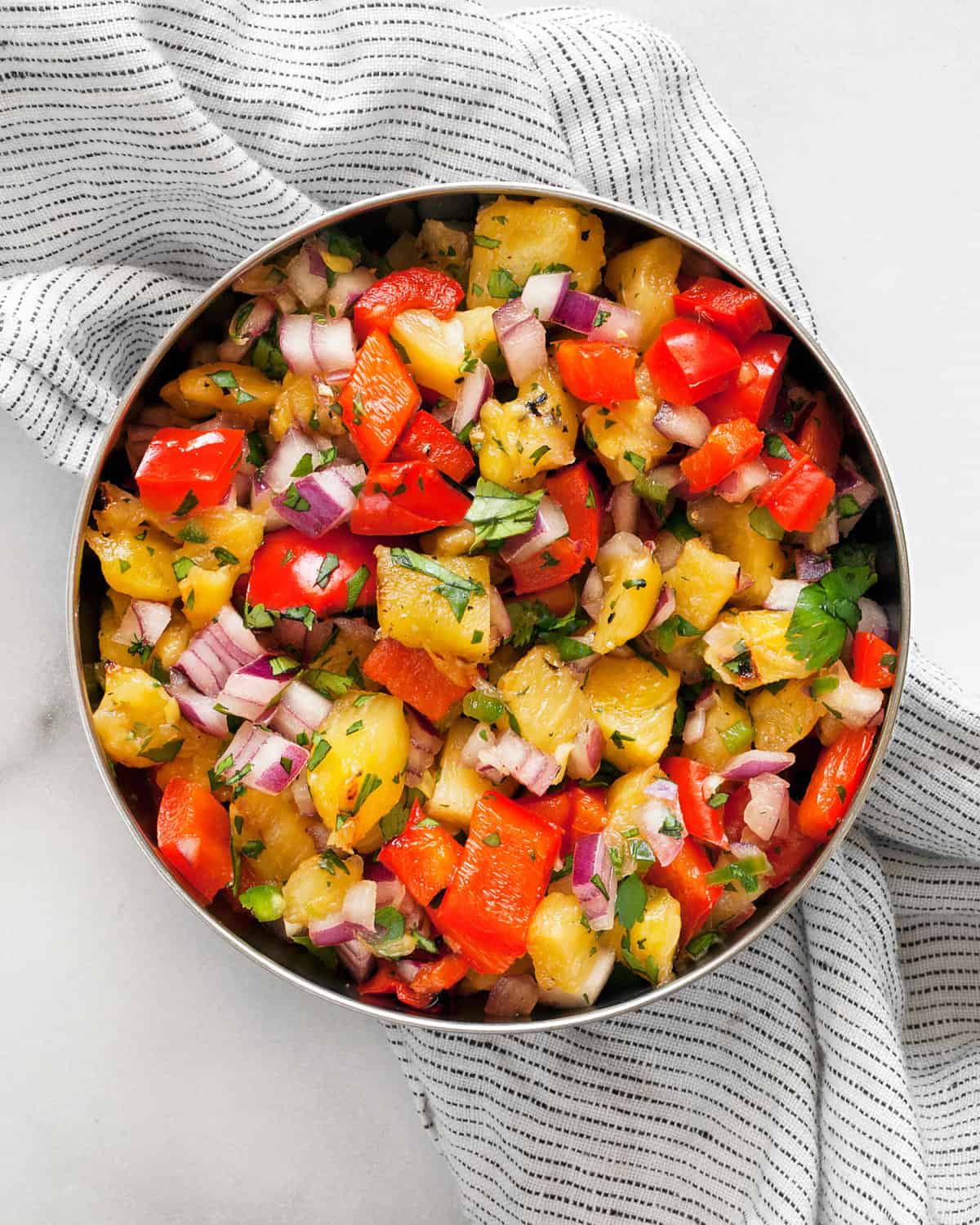 Grilled pineapple salsa in a bowl.