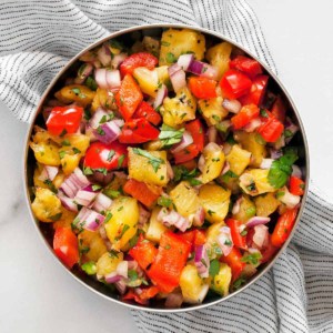 Grilled pineapple salsa in a bowl.