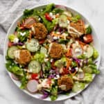 Baked falafel salad on a plate.