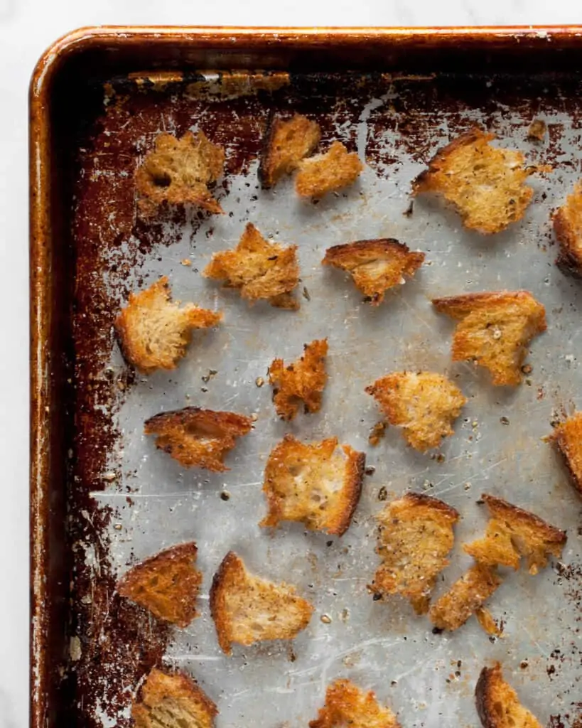 Toasted croutons on a sheet pan