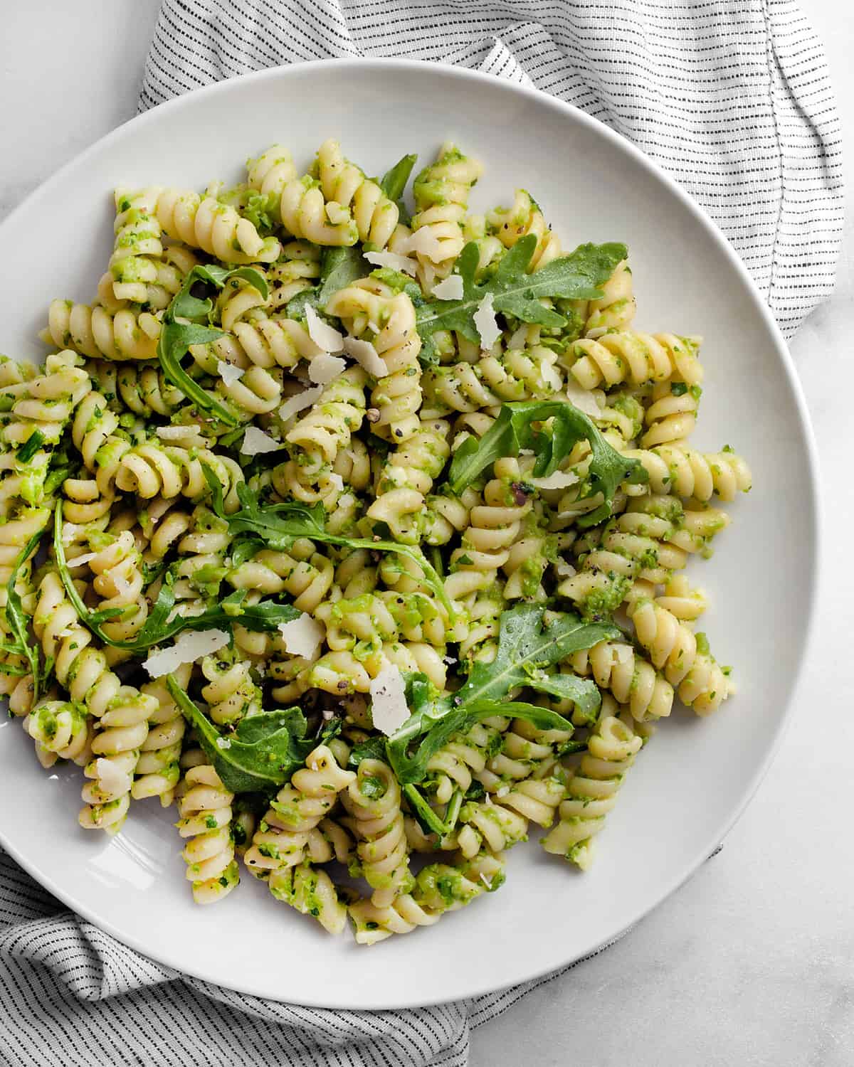 Pea pesto pasta on a plate.