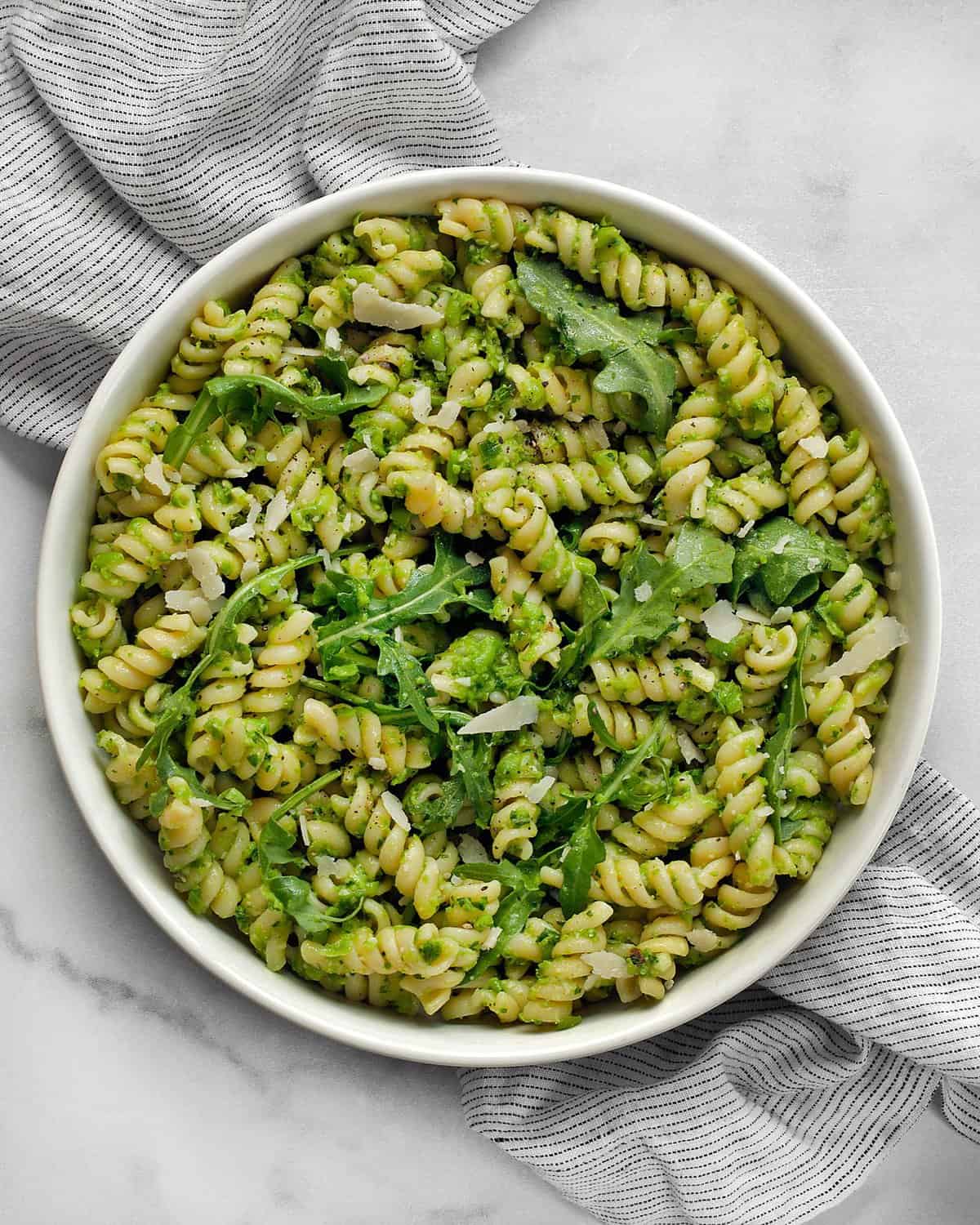 Pasta with pea pesto in a bowl.