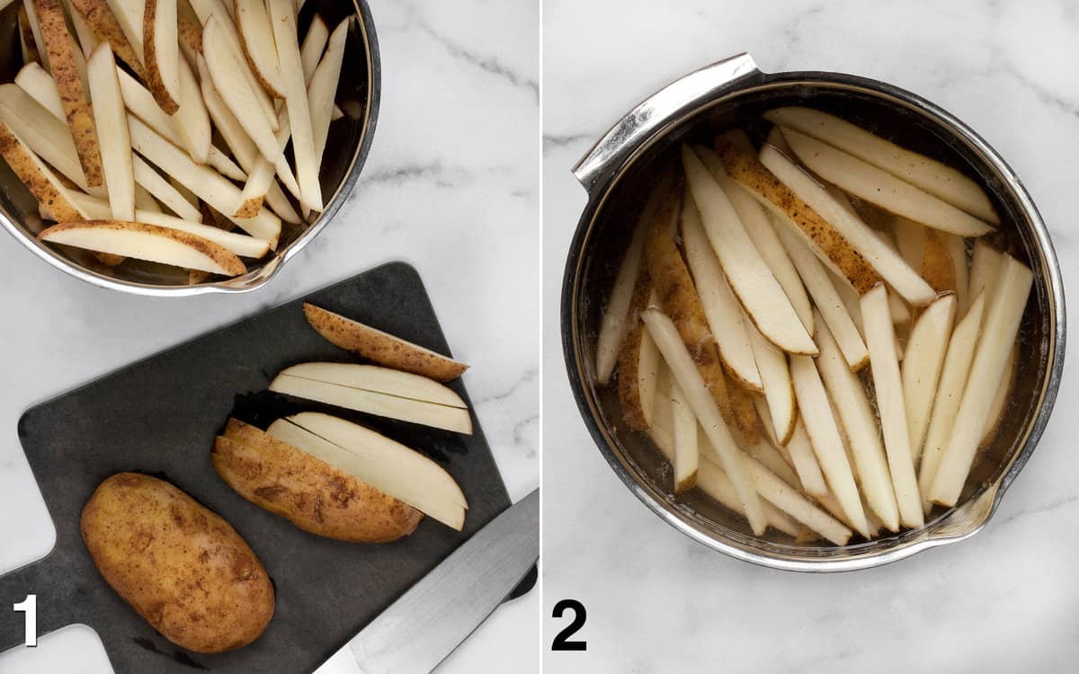 Sliced potatoes on a cutting board and soaking in a bowl of water.