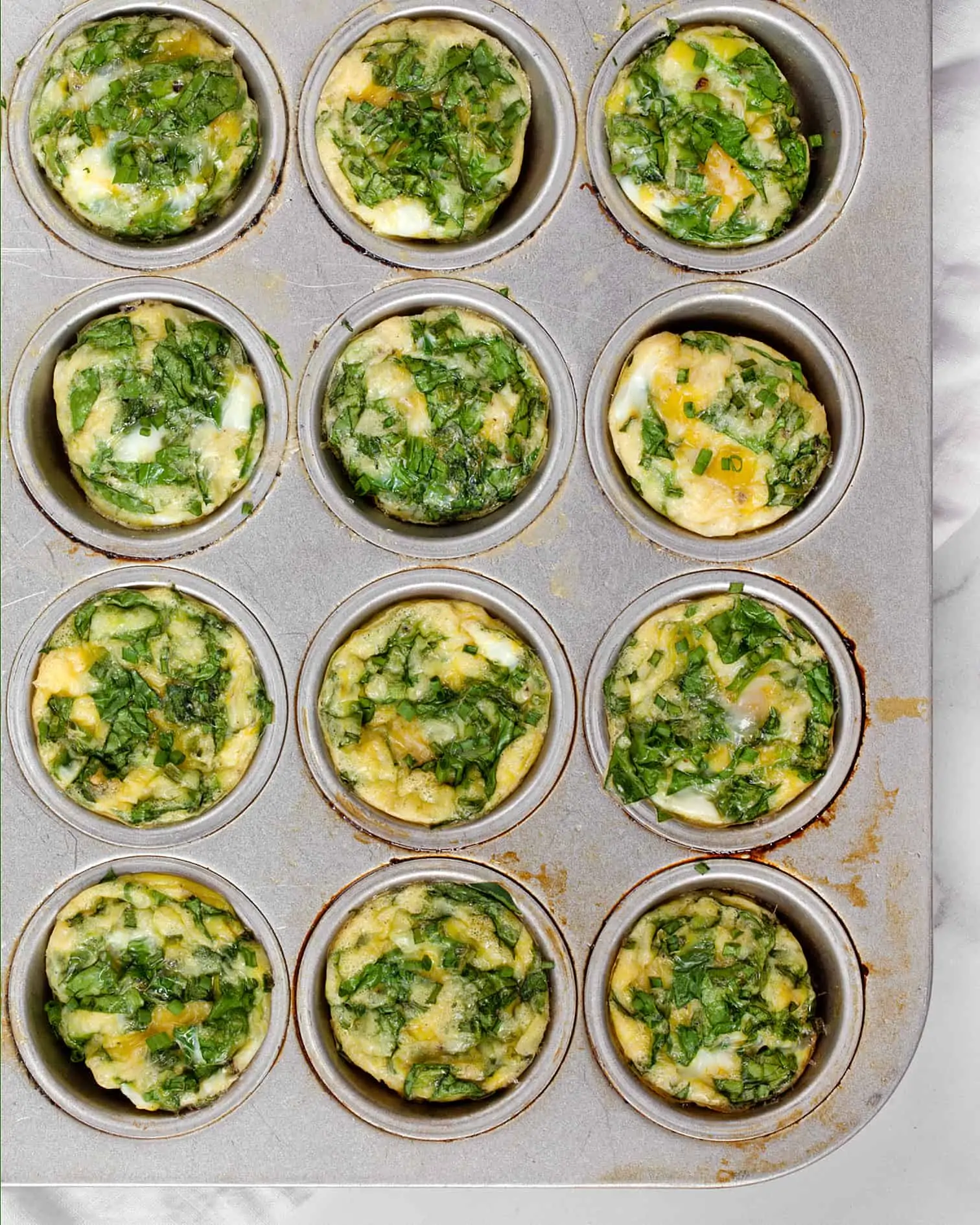 Mini Spinach Frittatas in muffin pan