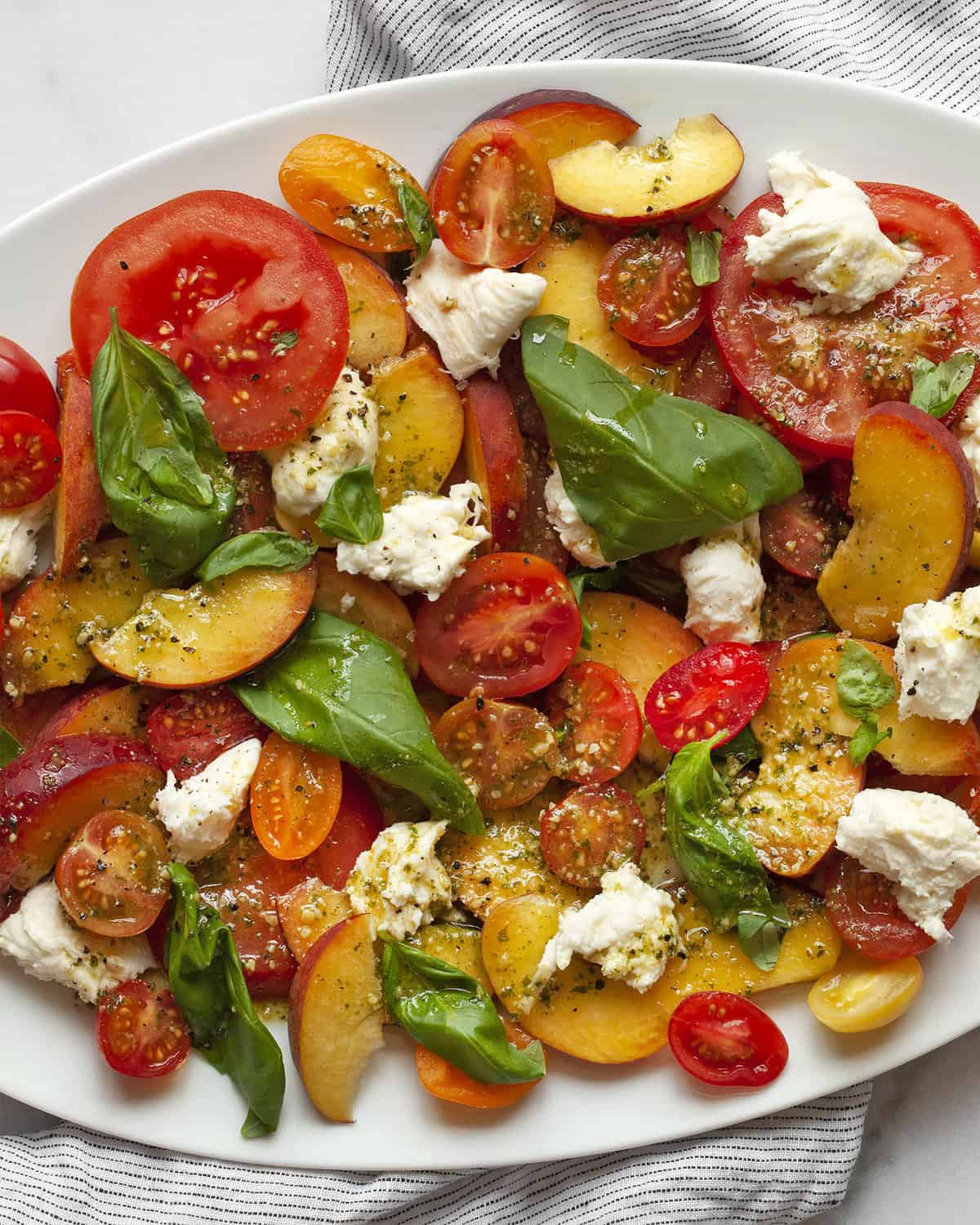 Detail image of peach caprese salad.