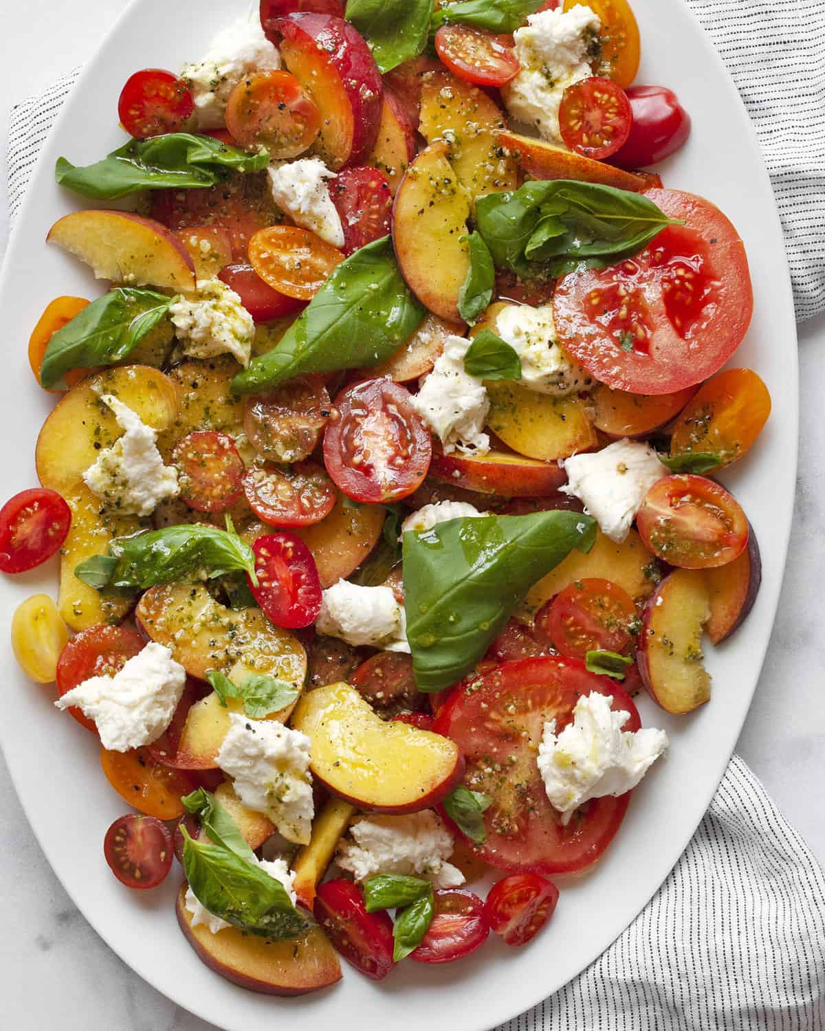 Detail image of peach caprese salad.