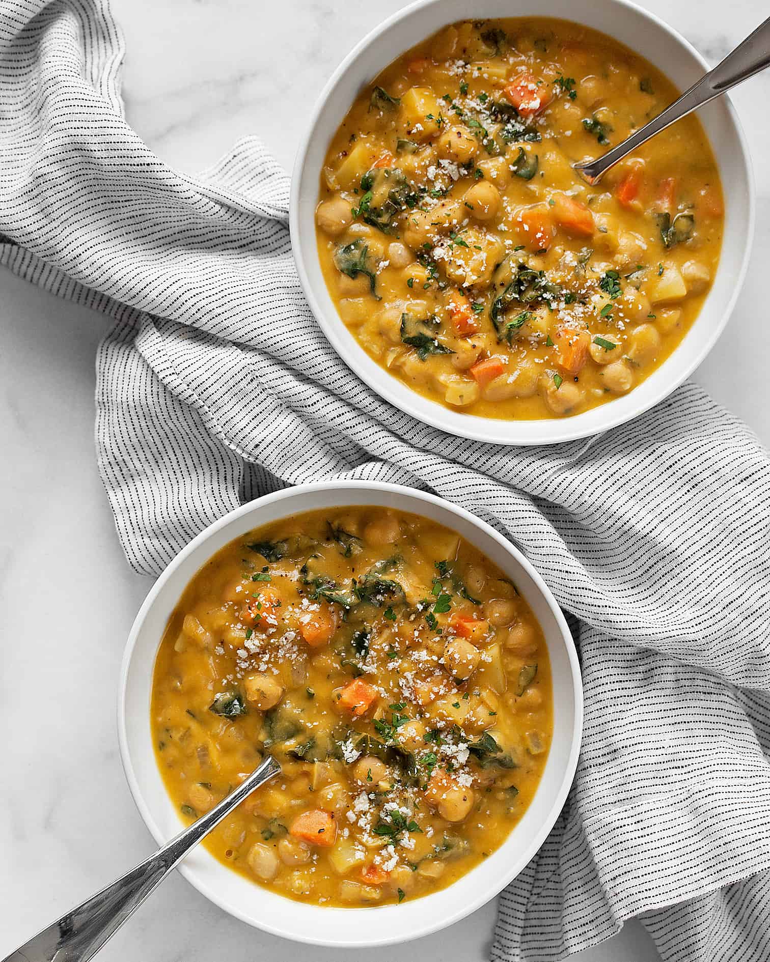 Chickpea soup in 2 bowls.