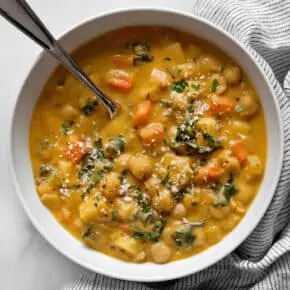 Soup with garbanzo beans and carrots in a bowl