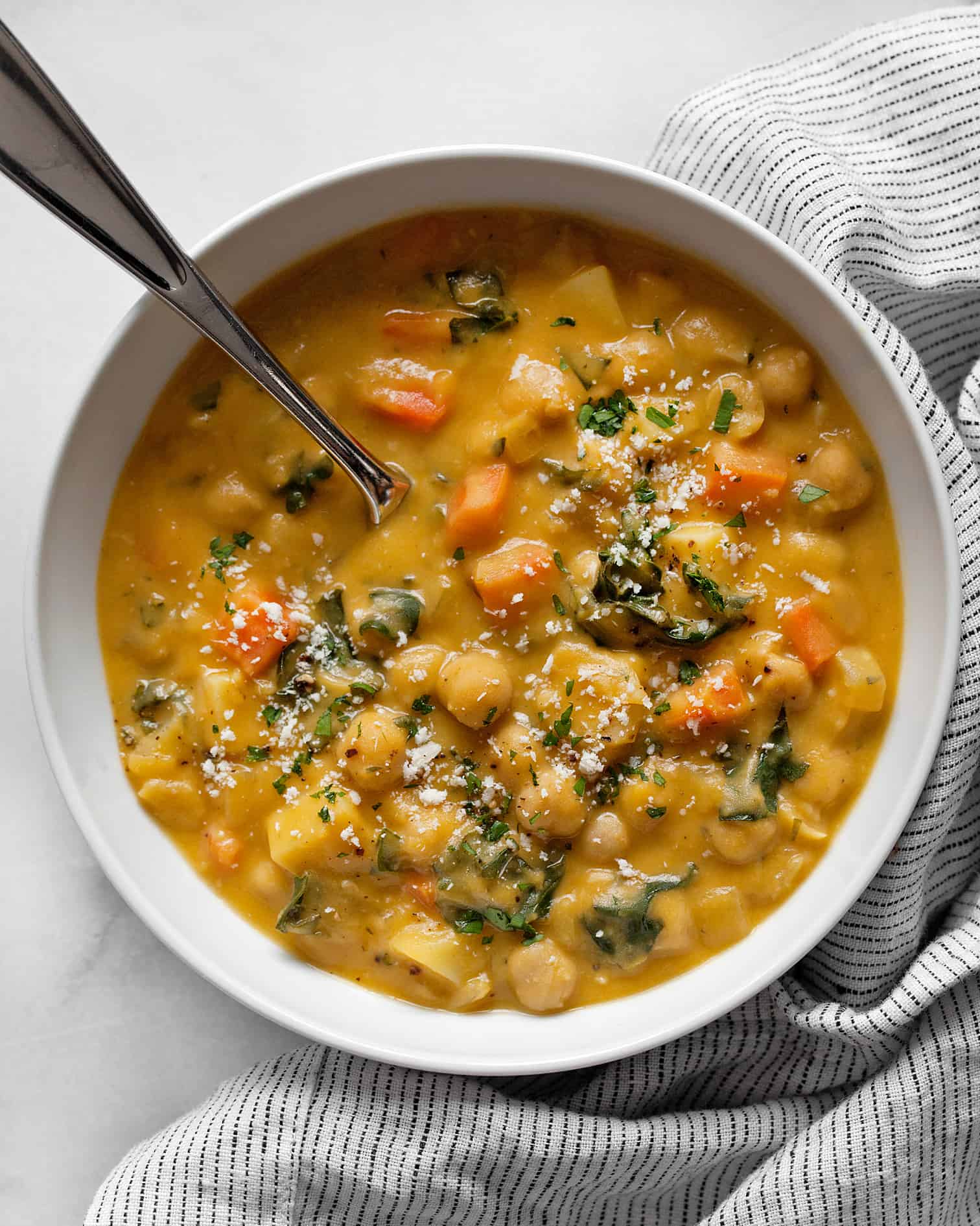 Soup with garbanzo beans and carrots in a bowl