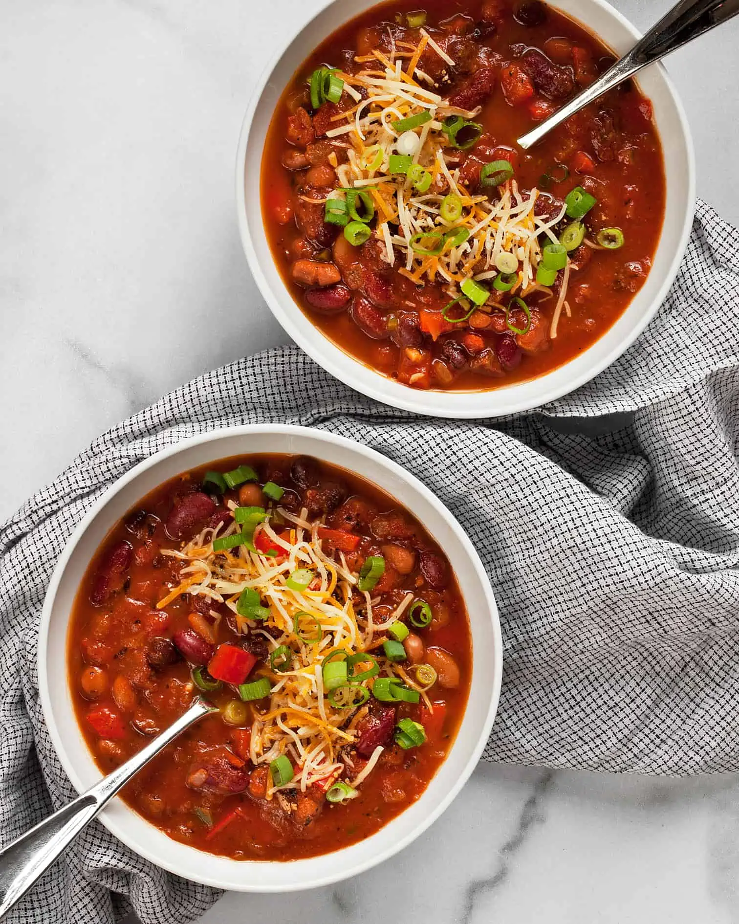 Two bowls of bean chili