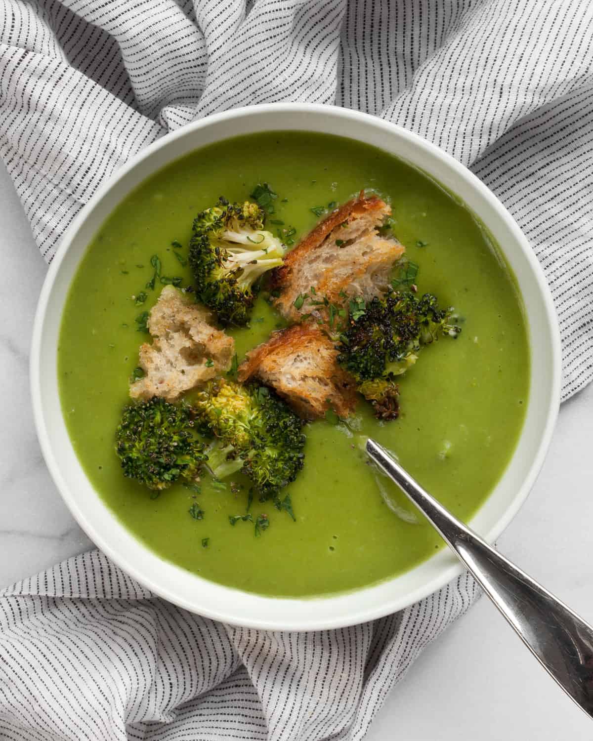 Broccoli spinach soup in a bowl.