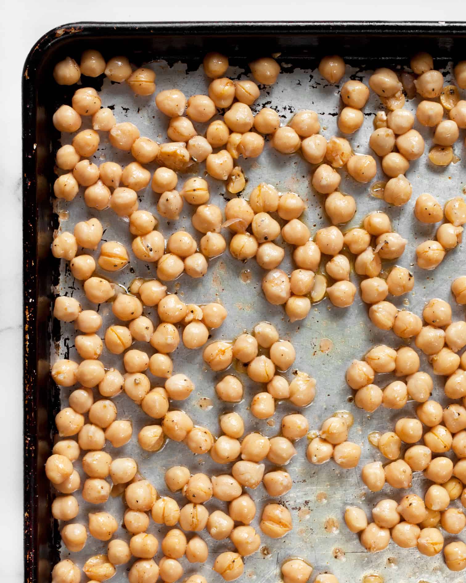 Marinated chickpeas on a sheet pan