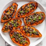 Loaded sweet potato skins on a plate