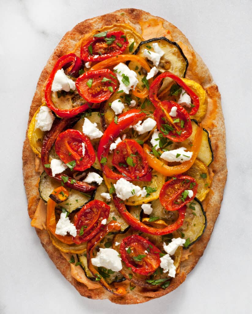 Naan flatbread pizza with vegetables.