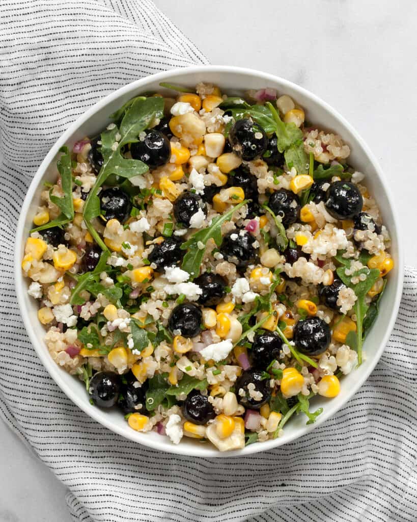 Blueberry salad with corn and quinoa in a bowl.