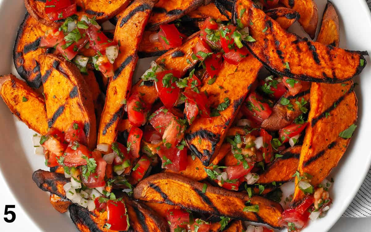 Sweet potatoes topped with pico de gallo.