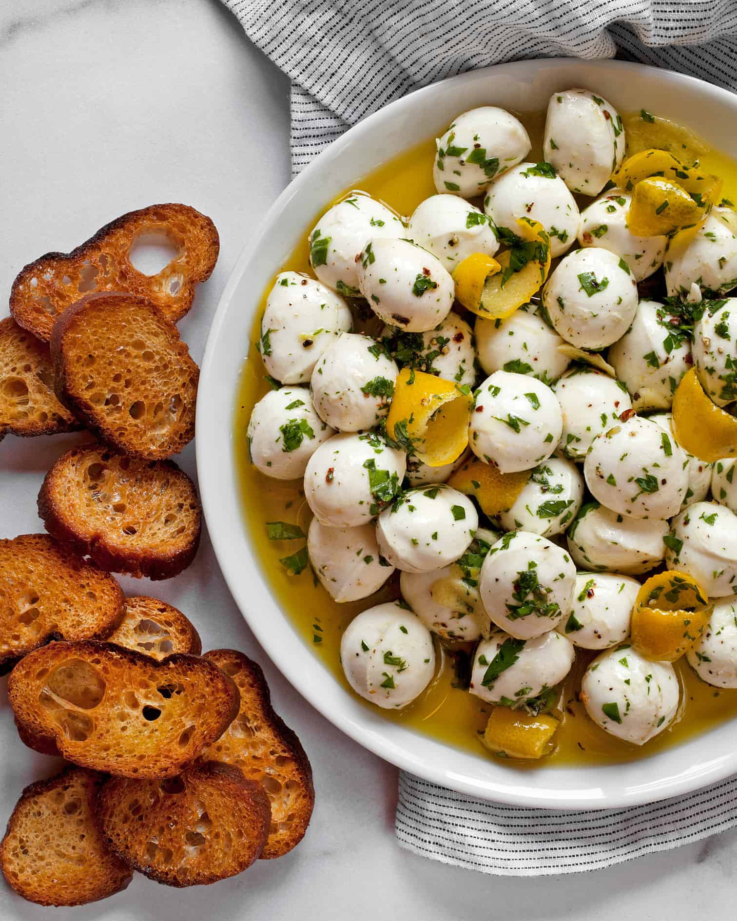 Marinated Mozzarella Balls with Toasted Bread