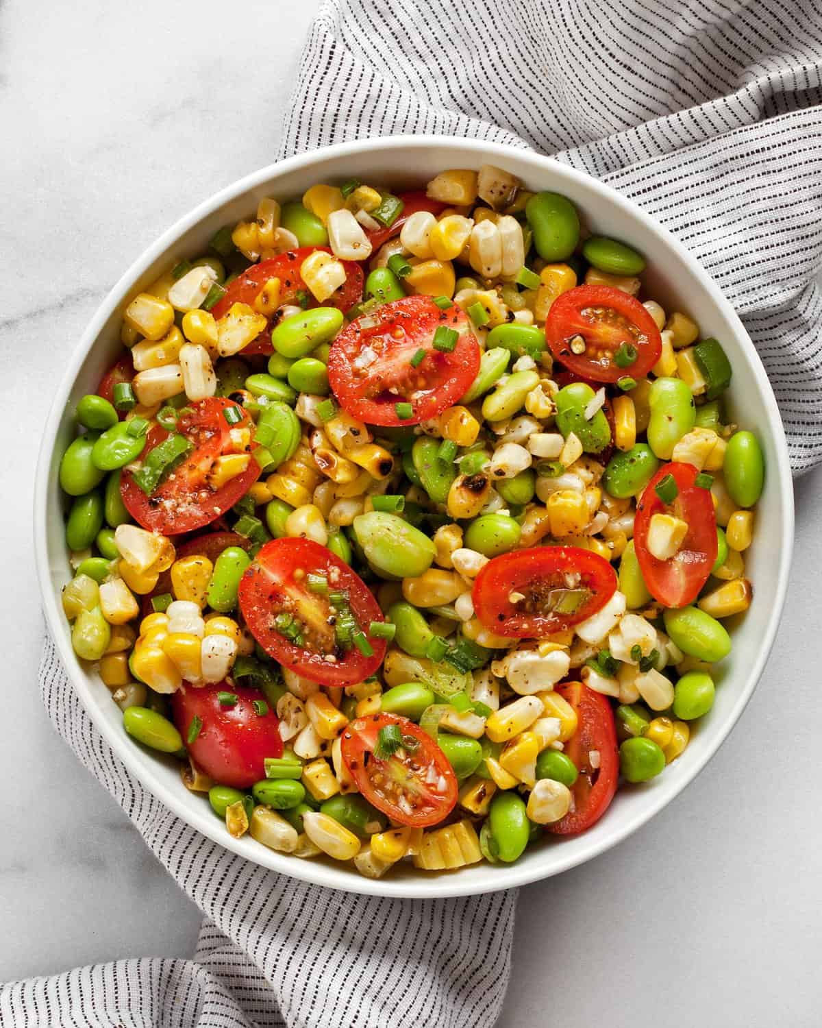 Grilled corn succotash in a bowl.