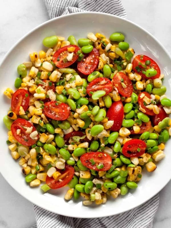 Grilled corn succotash on a plate.