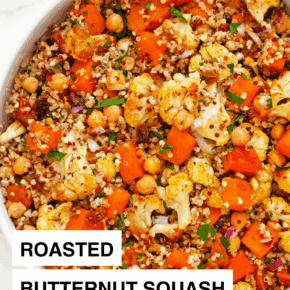 Roasted butternut squash cauliflower quinoa in a bowl.