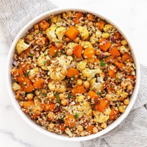 Roasted butternut squash cauliflower quinoa in a bowl.