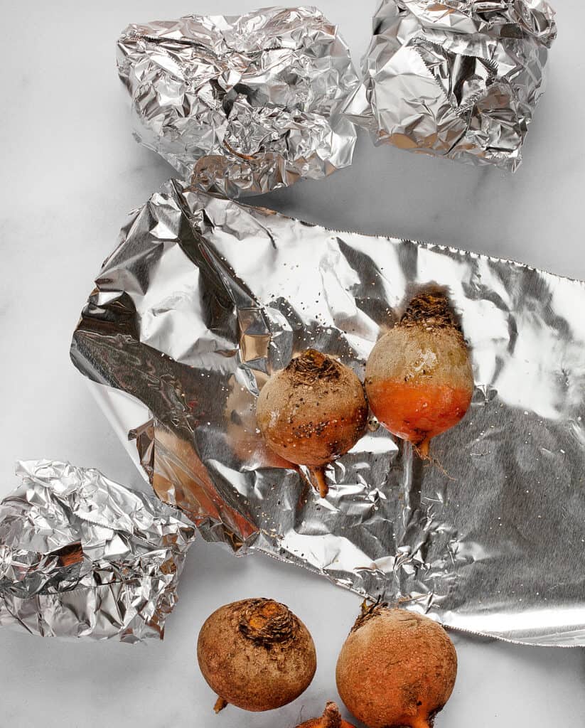 Wrap the raw beets in foil and drizzle them with olive oil, salt and pepper