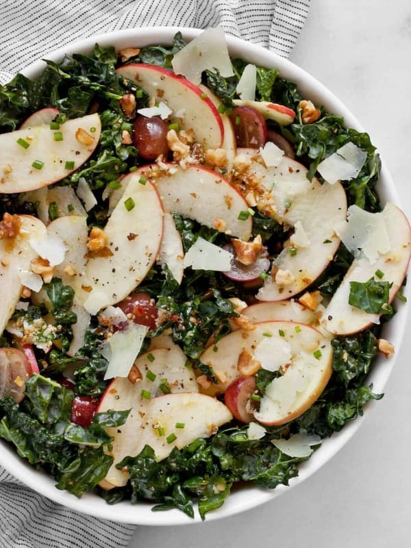 Detail image of kale apple salad in a bowl,