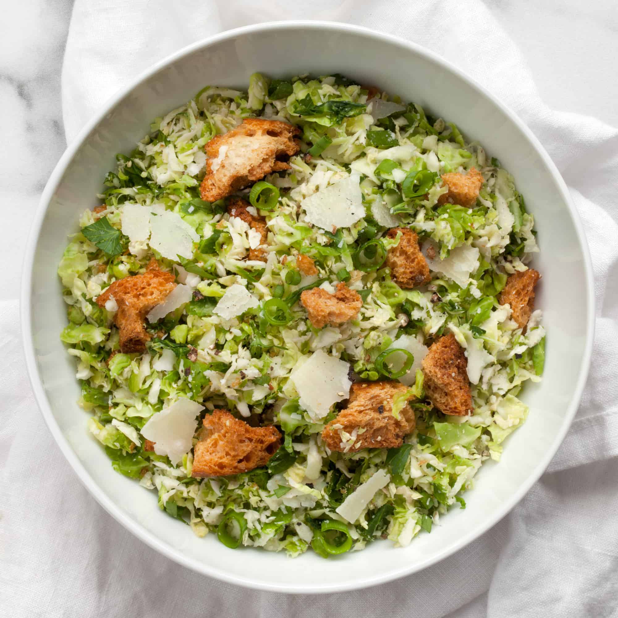 Shredded Brussels Sprout Caesar Salad Last Ingredient