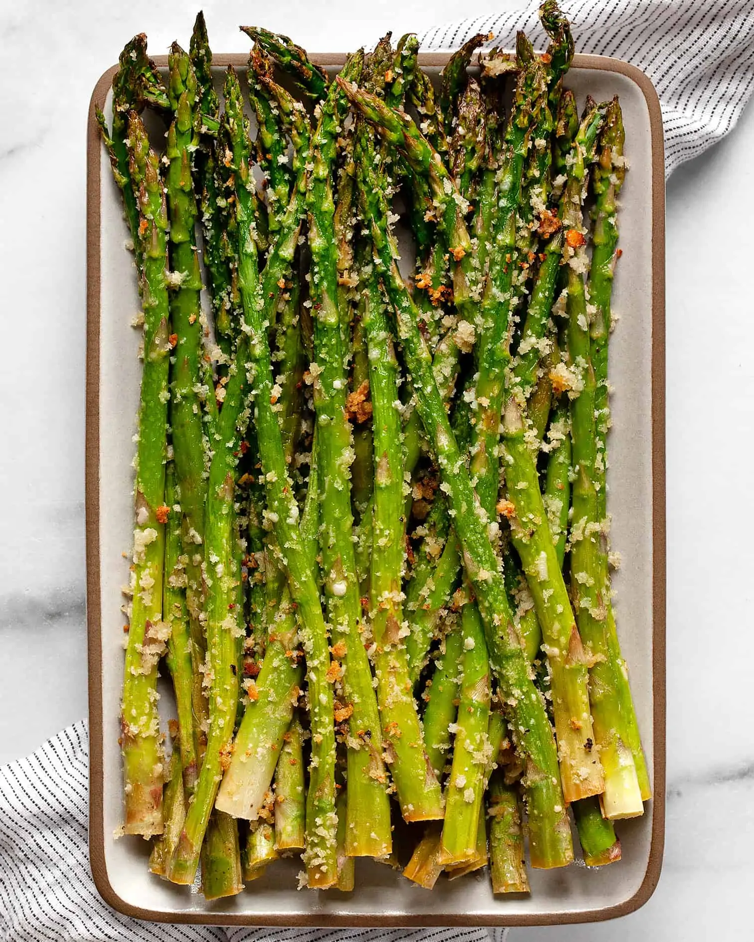 Parmesan roasted asparagus on a plate.