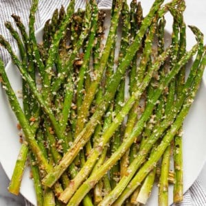 Parmesan roasted asparagus on a plate.