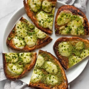 Slices of ramp garlic bread on a plate.