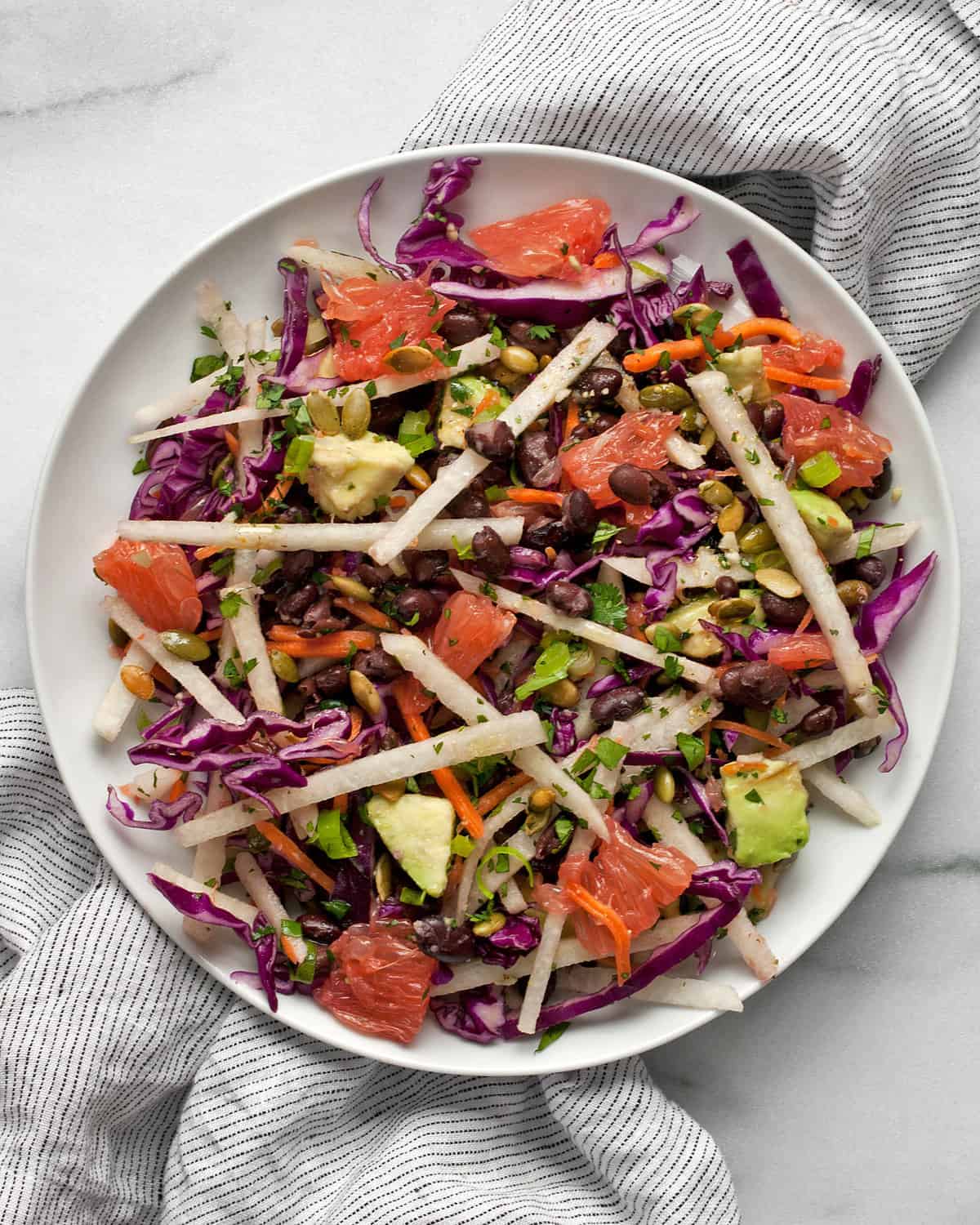 Jicama salad on a small plate.