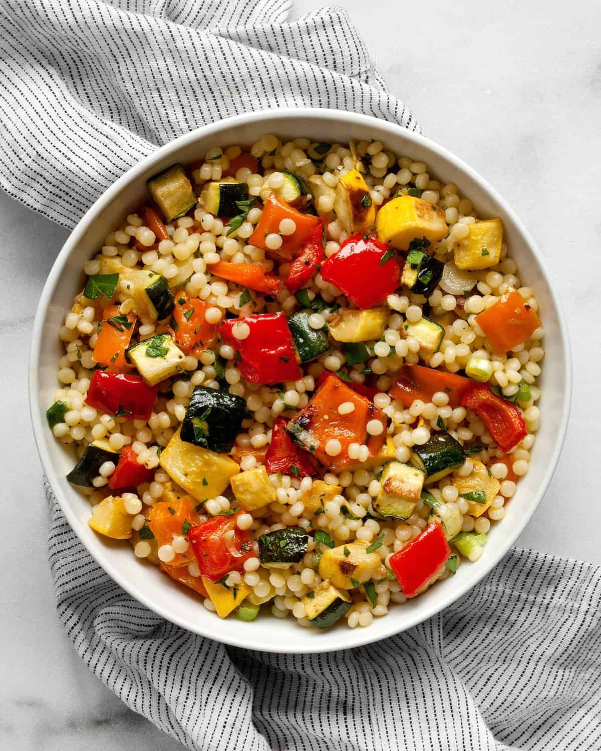 Roasted vegetable couscous in a bowl.