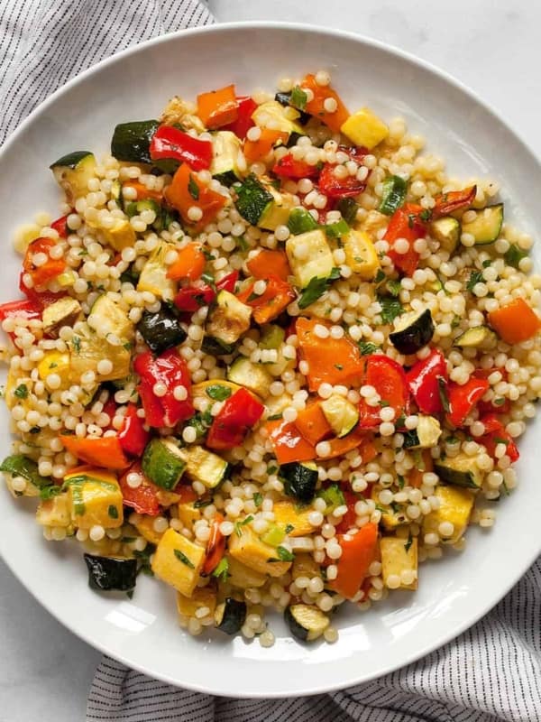 Roasted vegetable couscous on a plate.