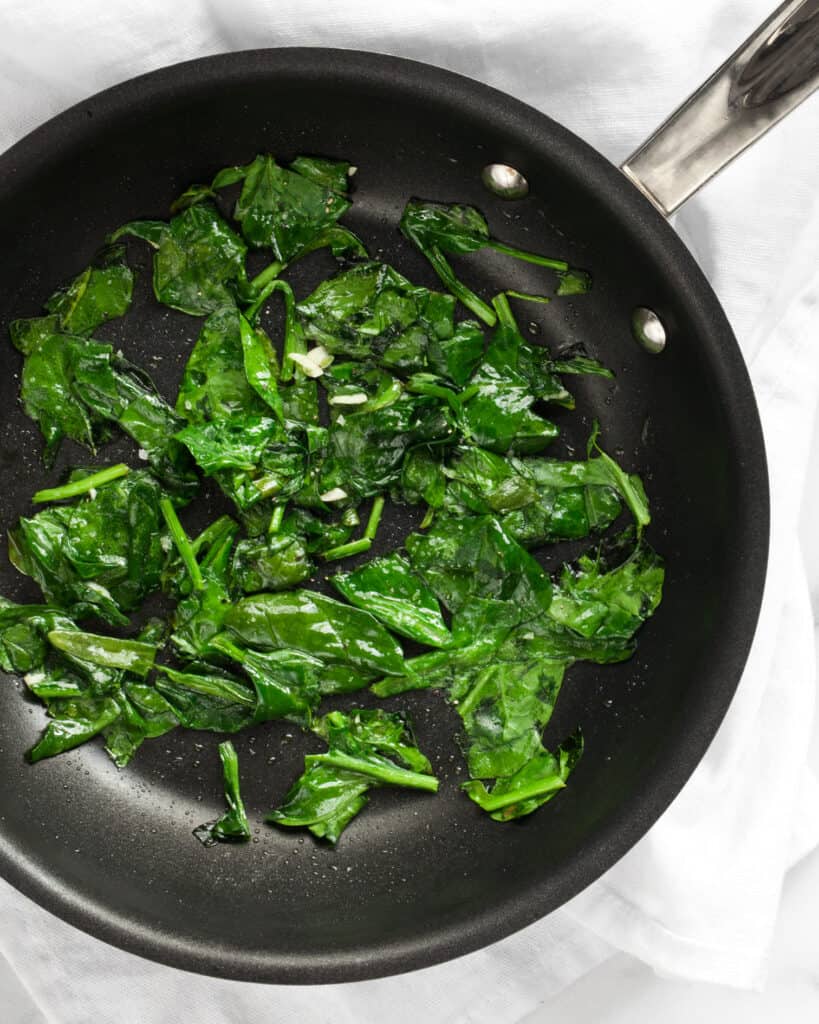 Sauteed spinach in a skillet