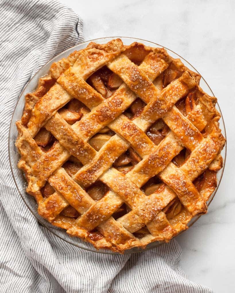 Salted caramel apple pie in a dish.