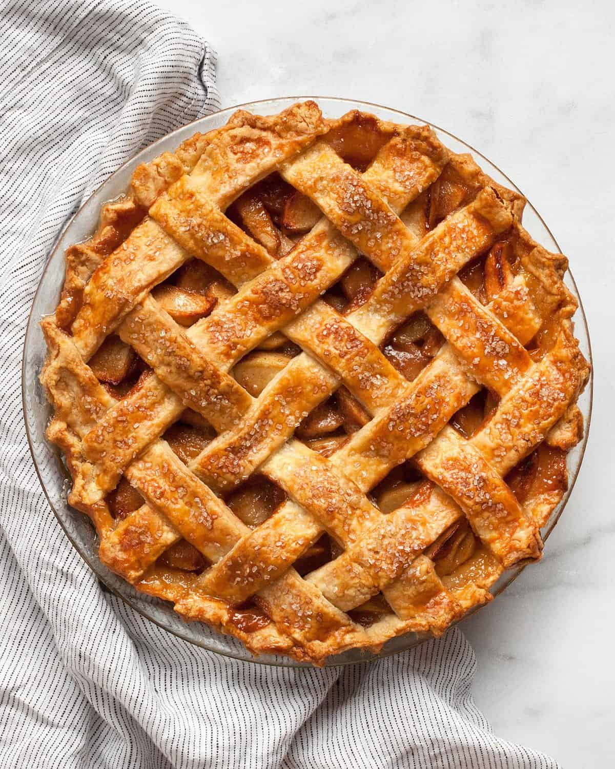 Salted caramel apple pie in a dish.