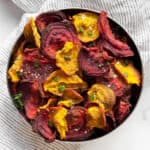 Baked beet chips in a bowl