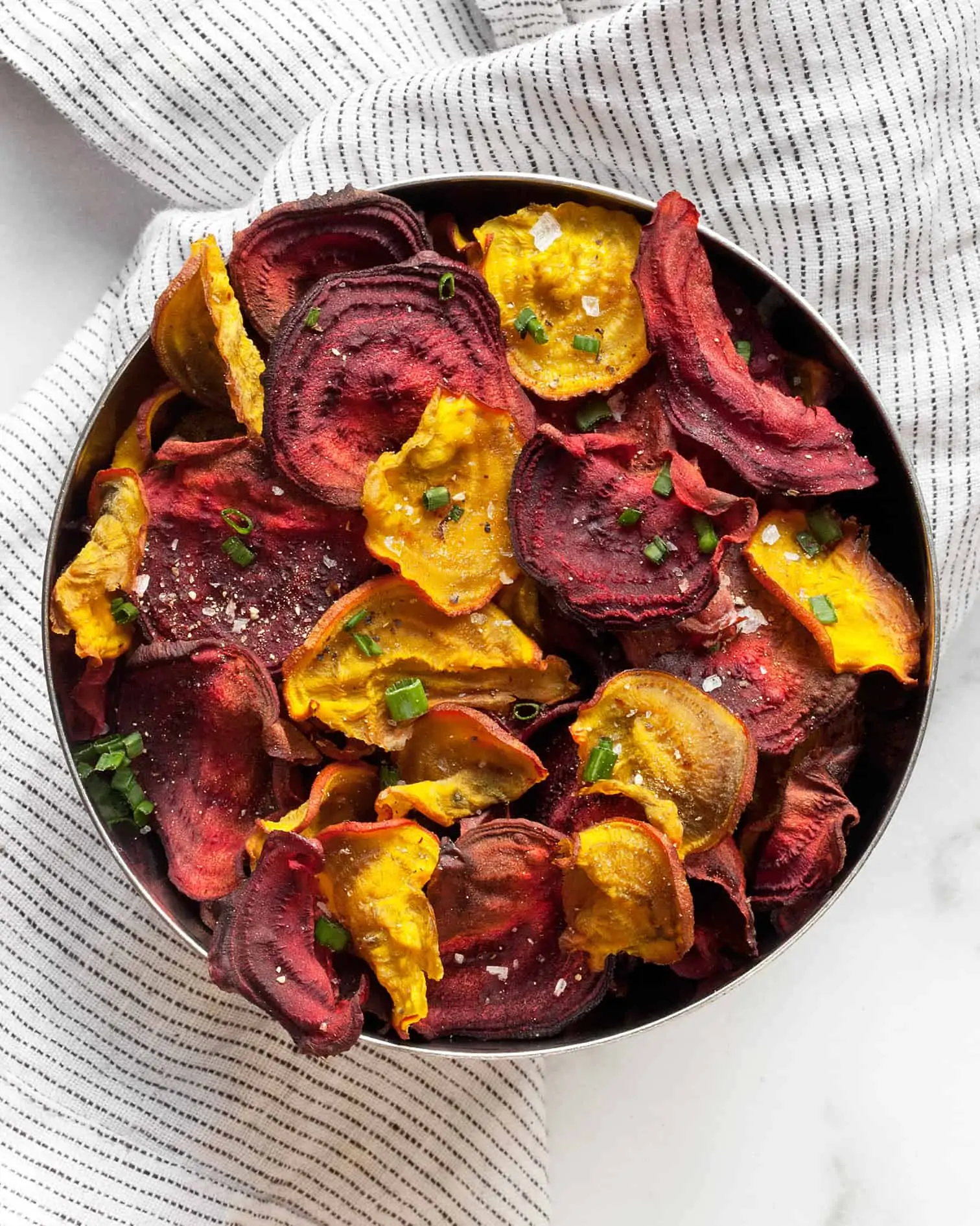 Baked beet chips in a bowl